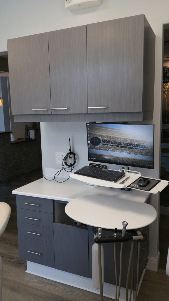 Photo of dental diagnostic inter-oral camera and computer